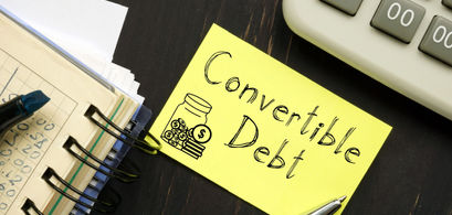 Induced Conversions of Convertible Debt